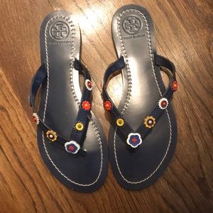 Tory Burch flip flops.